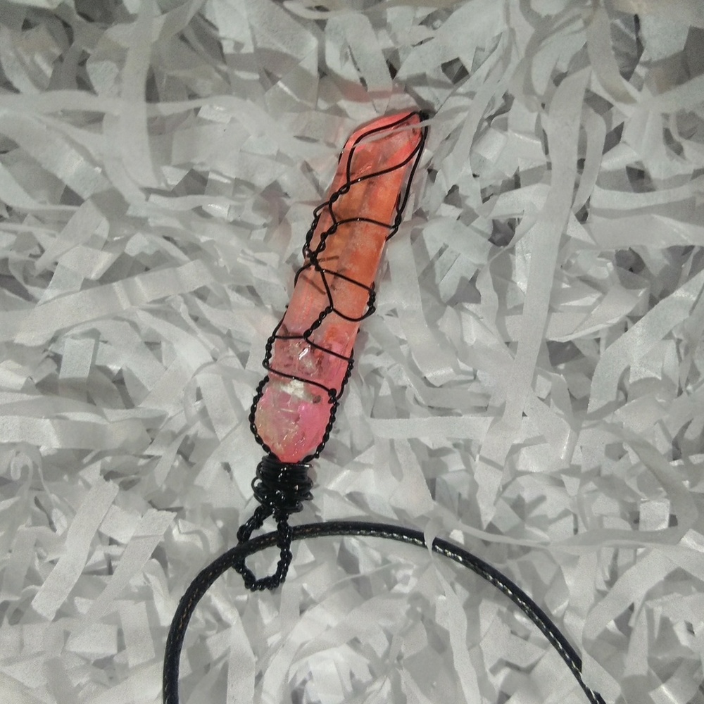 Cage wrapped crystal